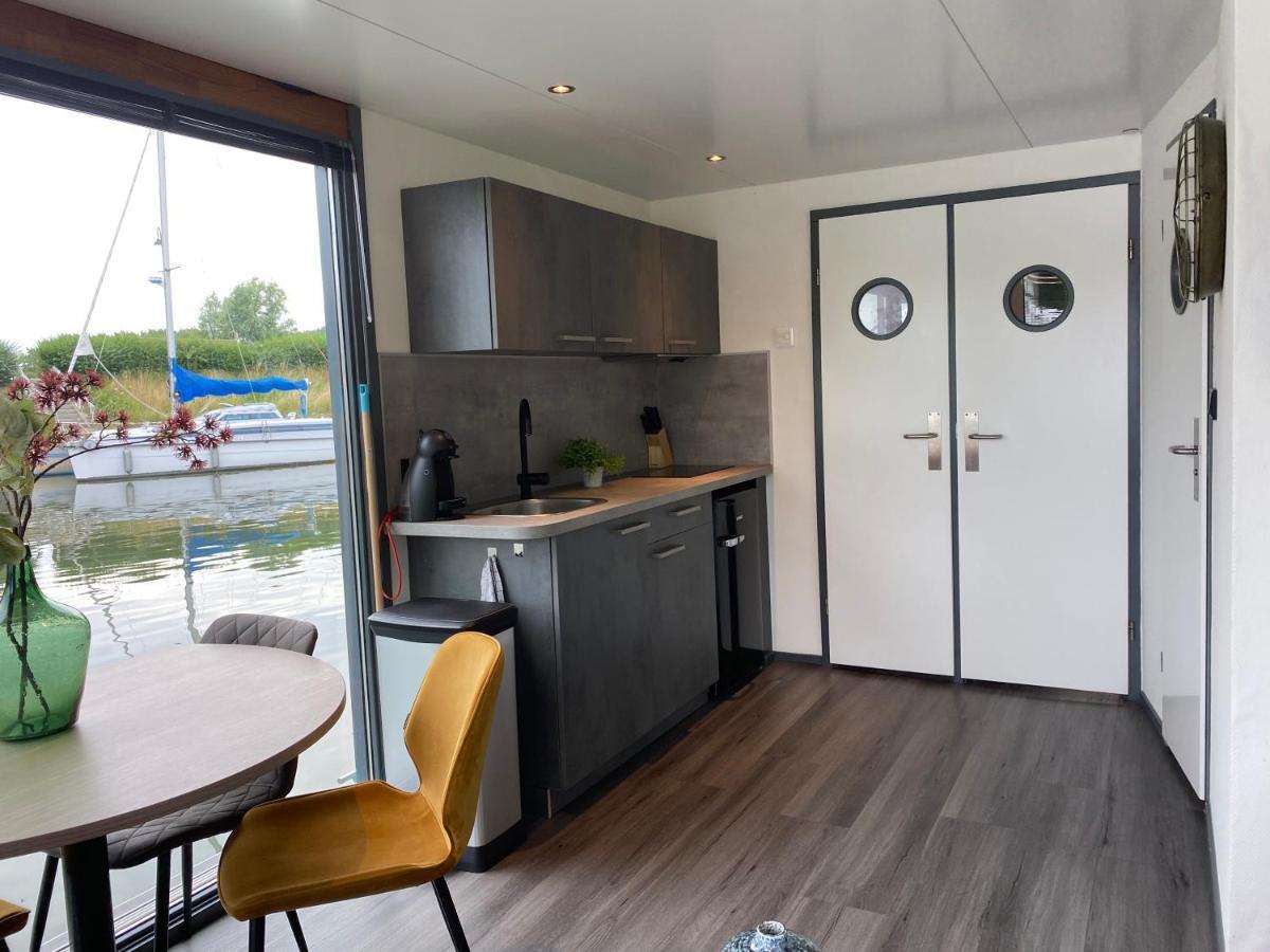 Houseboat De Amstel Hotel โมนนิคเคินดาม ภายนอก รูปภาพ